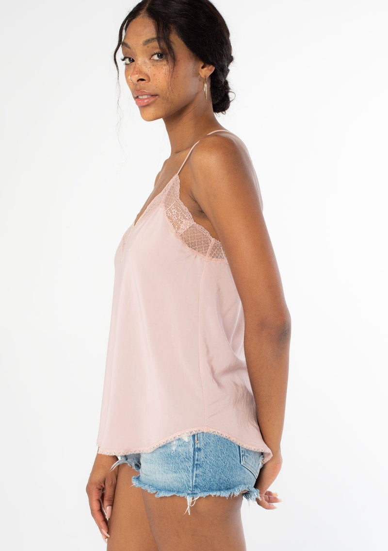 [Color: Vintage Rose] A loose fitting lace trimmed pink camisole with adjustable spaghetti straps, a v neckline, and a racerback.