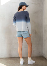 [Color: Charcoal/Grey] Girl wearing an ombre dyed casual pullover sweatshirt.