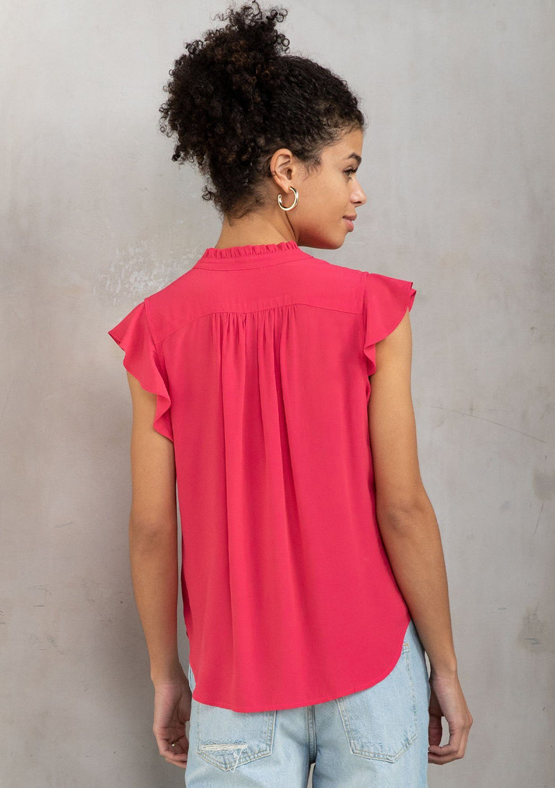 [Color: Watermelon] A classic dark pink bohemian top, designed in silky crepe. With short flutter cap sleeves and a self covered button front.