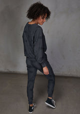 [Color: Charcoal] Relaxed, super soft jogger pants with cool distressed details. Featuring essential side pockets, a slightly tapered leg, and an elastic waistband. 