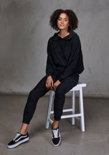 [Color: Black] Relaxed, super soft jogger pants with cool distressed details. Featuring essential side pockets, a slightly tapered leg, and an elastic waistband.