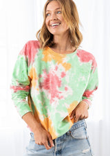 [Color: Red/Green Combo] A model wearing a red and green cotton tie dye sweatshirt. Featuring a classic crew neckline and long raglan sleeves.