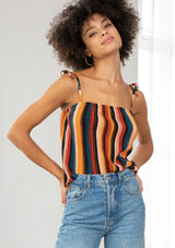 [Color: Black/Spice/Teal] A striped tie up tank top. The tie shoulder spaghetti straps and multicolor stripes add a retro feel to this cool and effortless top.