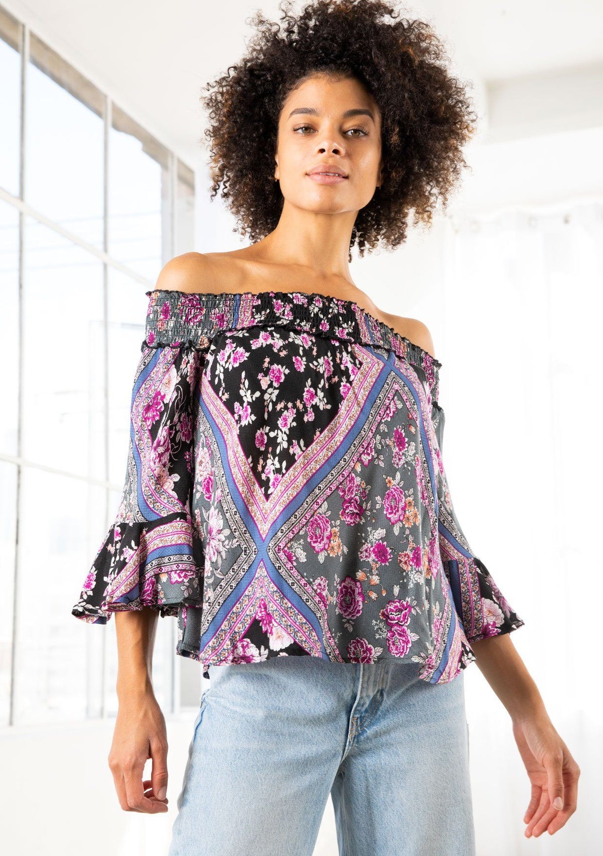 black floral off the shoulder top