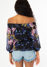 [Color: Black Royal] Stop and smell the roses in our gorgeous floral print off shoulder blouse. Featuring a flattering voluminous long sleeve, a smocked elastic neckline, and a waist defining tie front. A bohemian take on Fall style that pairs effortlessly with denim.