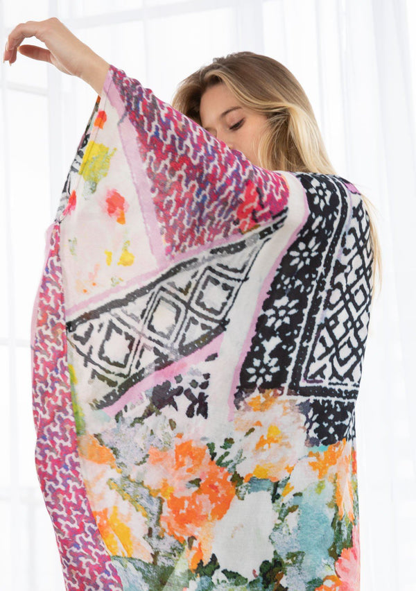 [Color: Black/Fuchsia Combo] A blond model wearing a mixed floral print mid length kimono. With a cocoon silhouette, kimono sleeves, and an open front.