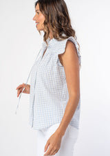 [Color: Periwinkle/White] A woman wearing a cotton blue and white gingham check print top with a button front and short flutter sleeves. 
