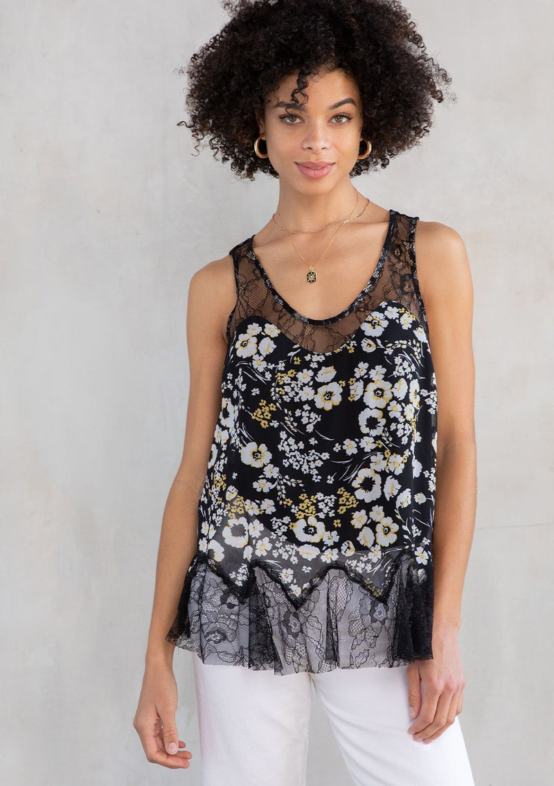 [Color: Black/Lemon] A model wearing a vintage inspired chiffon lace tank top in black and yellow floral print. With sheer lace yoke, straps, and hemline. 