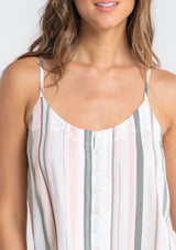 [Color: Off White/Olive] A model wearing an off white and olive green striped button front camisole with gold metallic thread details and a racerback. 