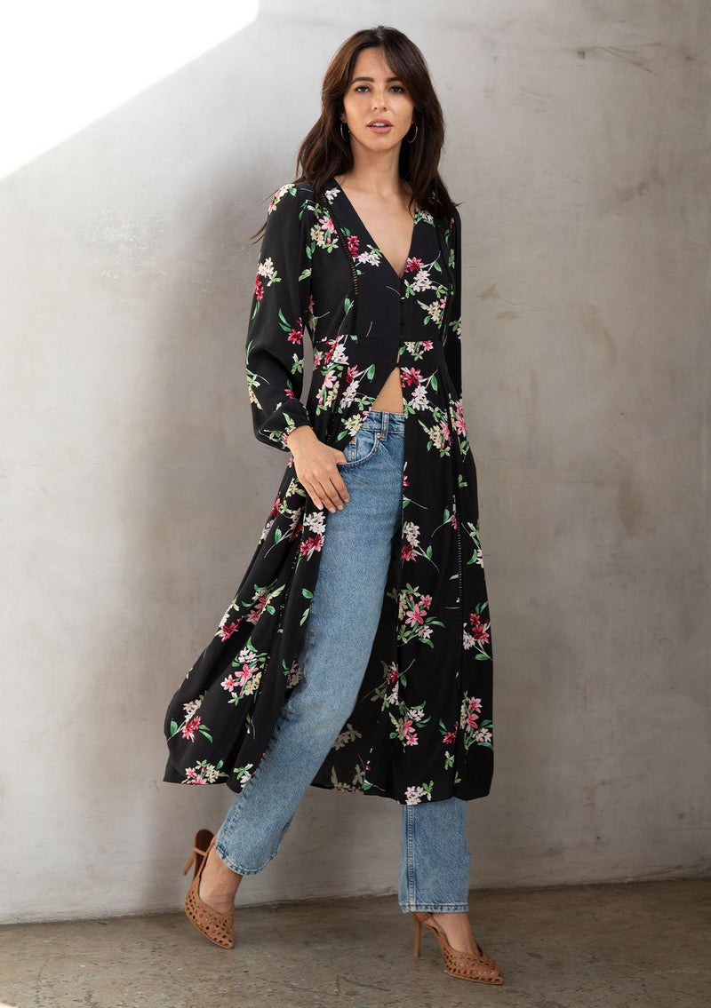 [Color: Black/Red] A one-of-a-kind style for any occasion, any season! This unique ankle-length bohemian black dress top features a pretty button front top with option to leave fully open, a flattering deep v-neckline, pretty floral print, and flattering long sleeves