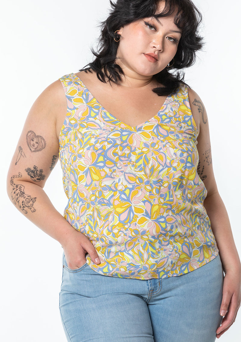 [Color: Blue/Lemon] A model wearing a blue and yellow vintage inspired retro floral print tank top.