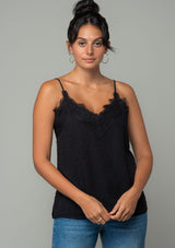 [Color: Black] A front facing image of a brunette model wearing a black clip dot camisole with a lace trim v neckline and adjustable spaghetti straps. The models hair is up in a bun. 