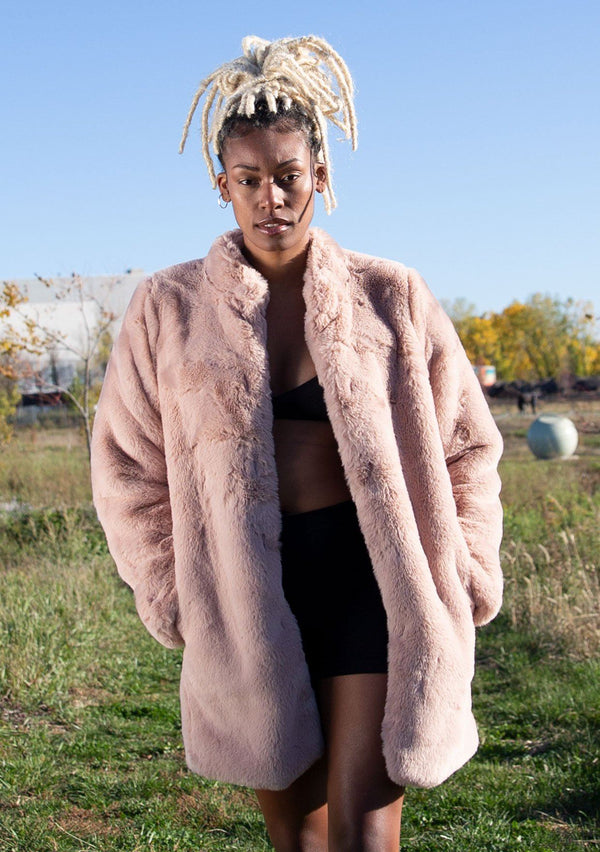 [Color: Blush] Ultra luxe faux fur statement coat in a soft pretty pink. Featuring essential side pockets, a silky lining, and a soft hand feel.