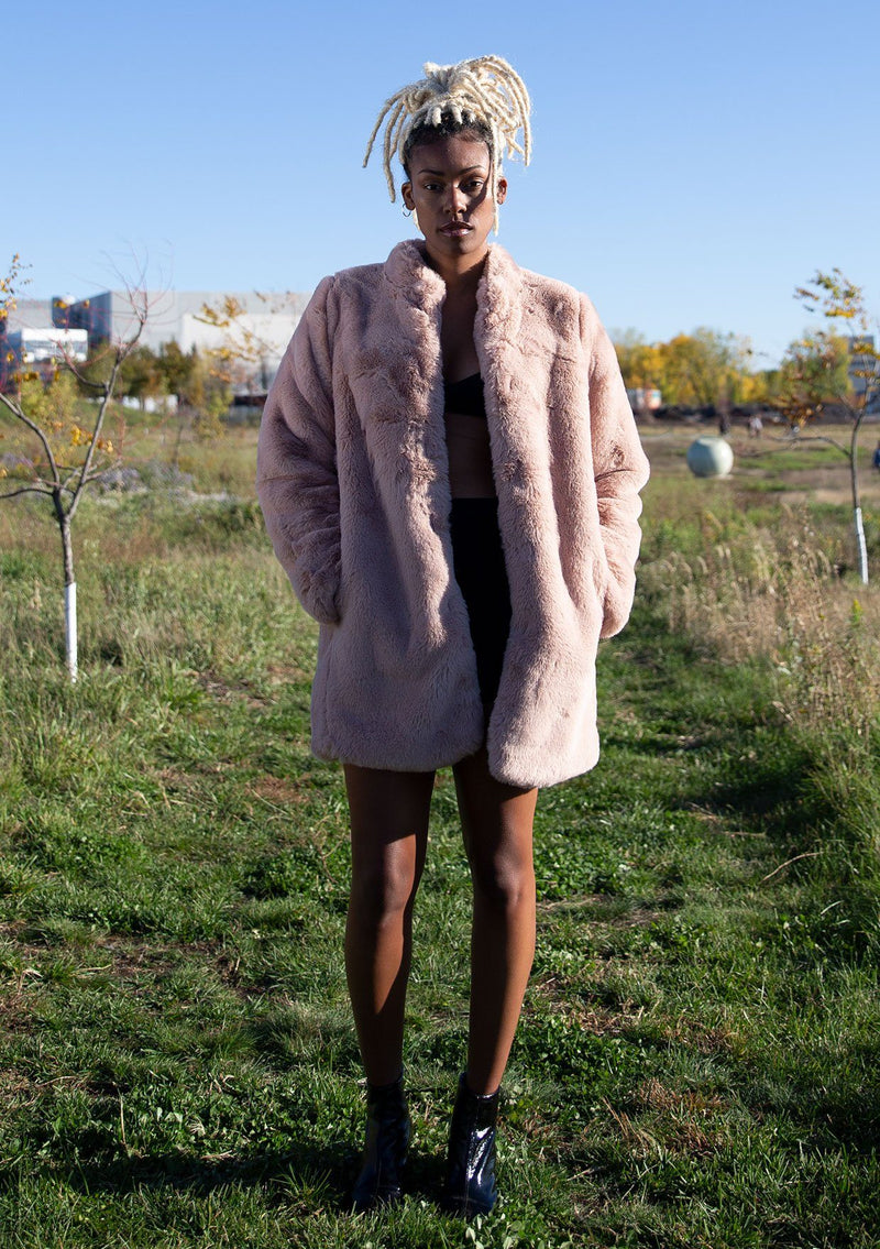 [Color: Blush] Ultra luxe faux fur statement coat in a soft pretty pink. Featuring essential side pockets, a silky lining, and a soft hand feel.