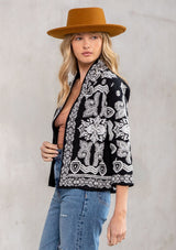 [Color: Black/OffWhite] A bohemian cropped embroidered jacket! Featuring pretty embroidered detail throughout and feminine three quarter length sleeves.