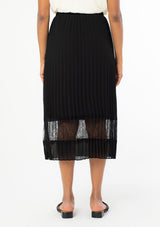 [Color: Black] A sunburst pleated mid length skirt. Featuring a delicate eyelash lace trim insert at the bottom of the skirt, an elastic waist, and elegant pleating throughout.