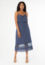 [Color: Steel Blue] A sunburst pleated mid length skirt. Featuring a delicate eyelash lace trim insert at the bottom of the skirt, an elastic waist, and elegant pleating throughout.