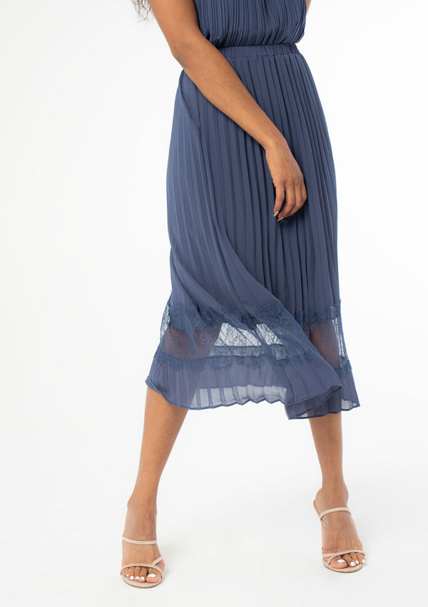 [Color: Steel Blue] A sunburst pleated mid length skirt. Featuring a delicate eyelash lace trim insert at the bottom of the skirt, an elastic waist, and elegant pleating throughout.