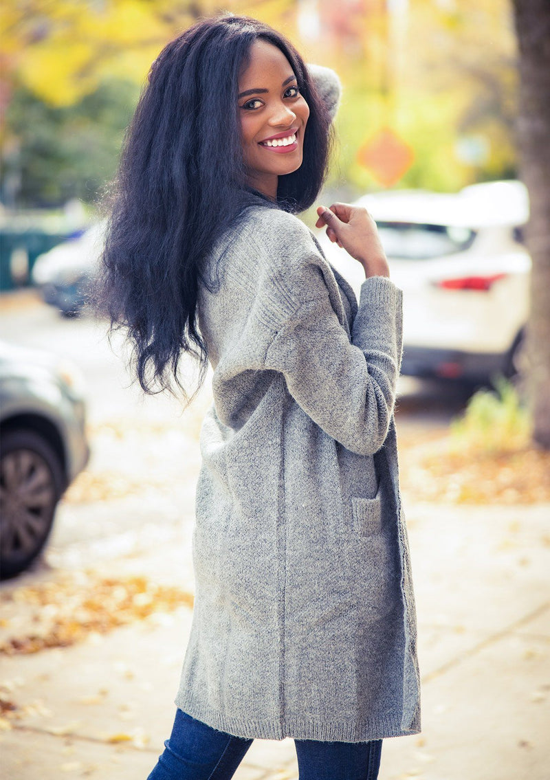 [Color: Heather Grey] A classic mid length cardigan. Featuring essential side pockets and contrast ribbed trim. 