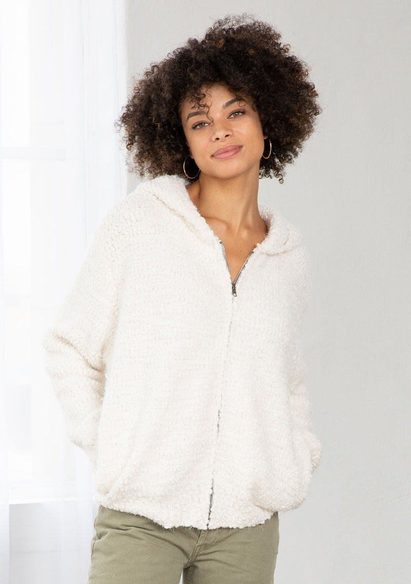 [Color: Winter White] An ultra soft and warm white zip up hoodie that feels like the best bear hug you have ever received. Featuring a bomber style silhouette and essential side pockets.