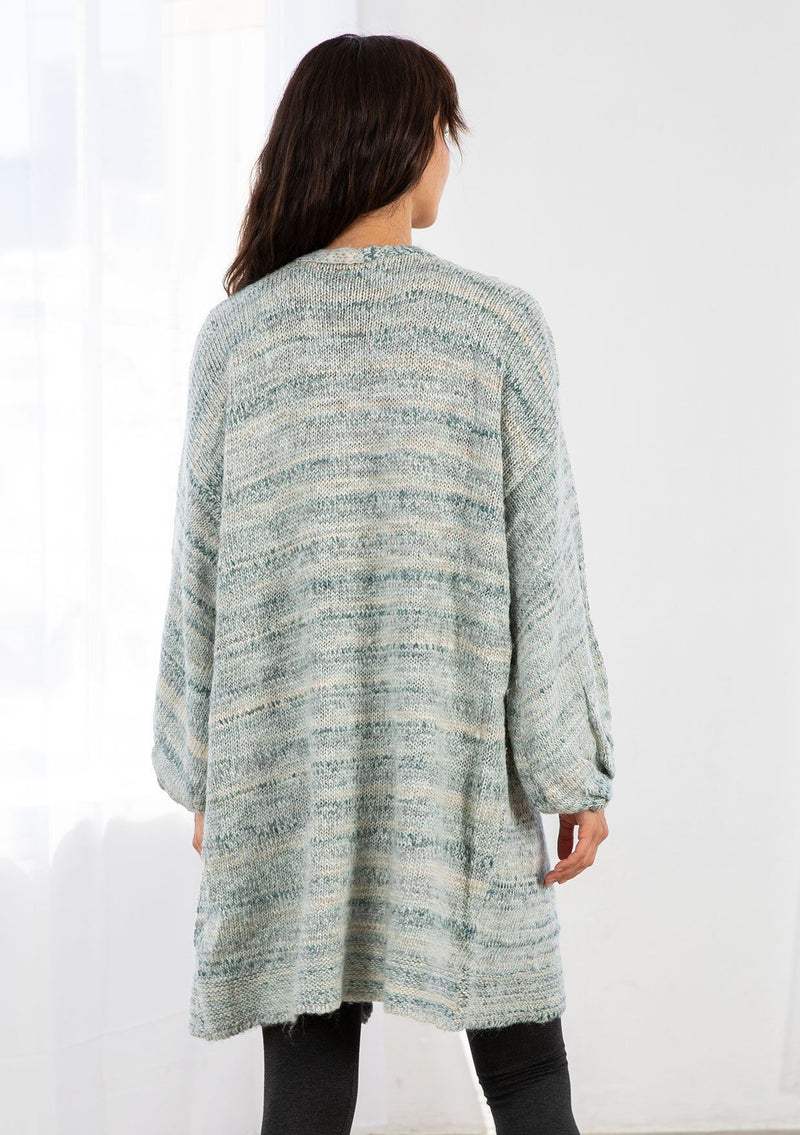 [Color: Seafoam Multi] A timeless classic, this effortlessly cool chunky melange knit cardigan features flattering voluminous balloon sleeves, a relaxed and cozy silhouette, and the perfect mid length hemline.