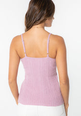 [Color: Dusty Lilac] A model wearing a light purple slim fit knit sweater tank top with adjustable straps and a v neckline. 