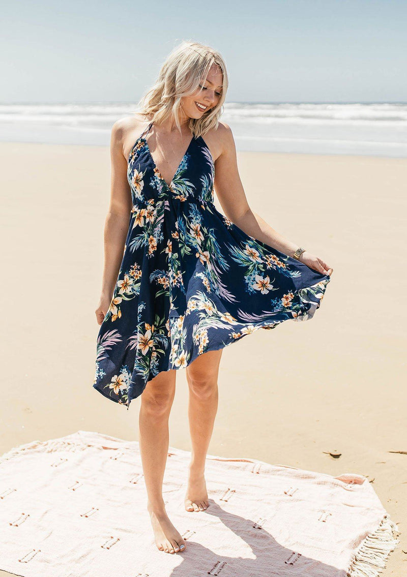 [Color: Navy] Lovestitch navy, floral printed, halter mini dress featuring shark bite hem and open back.