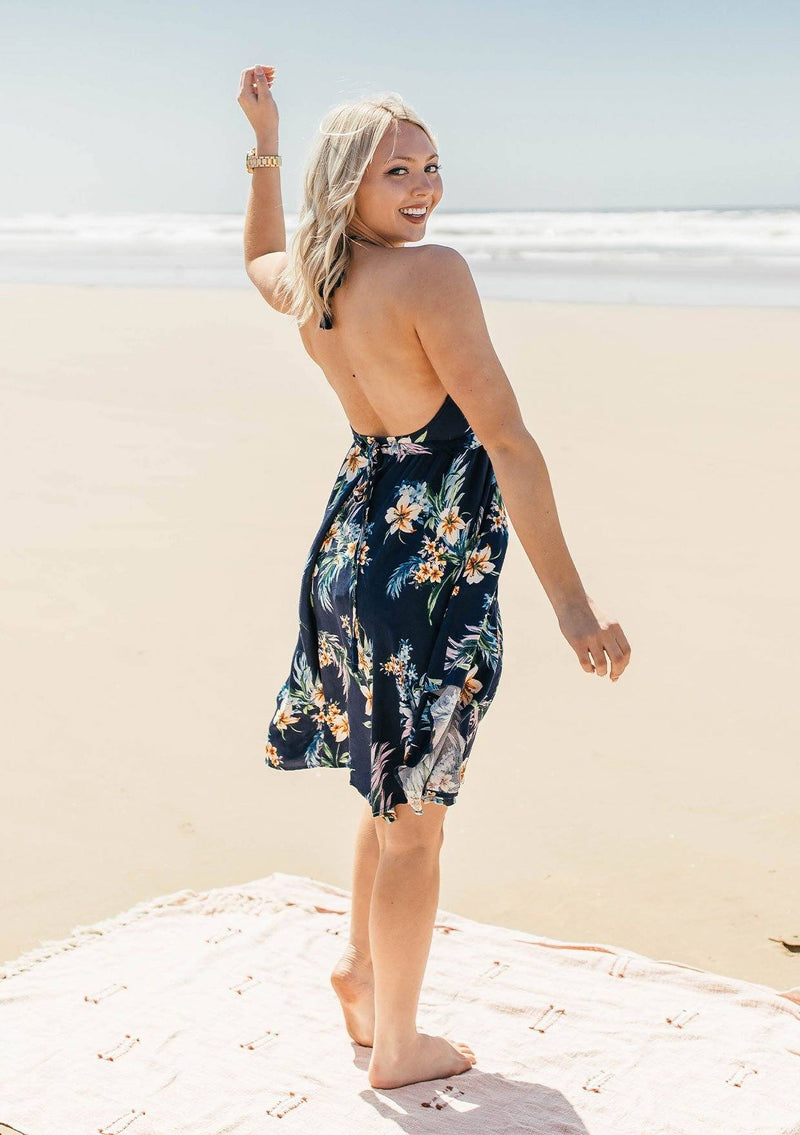 [Color: Navy] Lovestitch navy, floral printed, halter mini dress featuring shark bite hem and open back.
