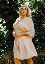 [Color: Peach/Gold] Lovestitch adorable cute and casual mini dress with long flattering kimono sleeves, a V-neckline and V-back with tie details. Smocked waist for a flattering fit.