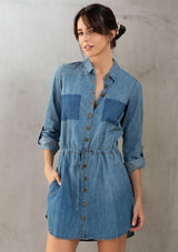 [Color: Indigo] Lovestitch Long sleeve, buttondown, cotton shirt dress with faded pocket detail.