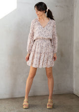 [Color: Almond/Cream] Lovestitch pink Floral printed, smocked waist mini dress with volume sleeves and tassel tie neck.