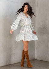 [Color: Cream/Sky] Lovestitch cream/sky Floral printed, smocked waist mini dress with volume sleeves and tassel tie neck.