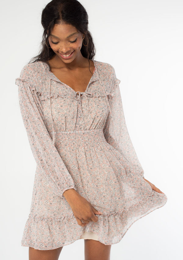 [Color: Blush Ivory] Ultra feminine and flirty sheer ditsy floral mini dress. Featuring a smocked elastic waist, long volume sleeves and elastic cuffs.