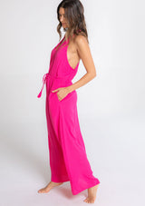 [Color: Hot Pink] A model wearing a sleeveless neon pink maxi dress. With a racerback, an adjustable drawstring waist, and v neckline.
