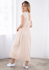 [Color: Natural] A relaxed fit maxi dress with short capped sleeves, a v neckline in front and back with a tassel tie closure, and a half elastic waist in the back.