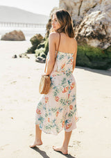 [Color: Blush/Green] A tropical floral print skirt set. With a cropped tube top and a mid length wrap skirt. 