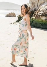 [Color: Blush/Green] A tropical floral print skirt set. With a cropped tube top and a mid length wrap skirt. 