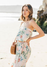 [Color: Blush/Green] A tropical floral print skirt set. With a cropped tube top and a mid length wrap skirt. 