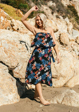 [Color: Black/Coral] A tropical floral print skirt set. With a cropped tube top and a mid length wrap skirt. 