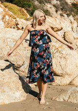 [Color: Black/Coral] A tropical floral print skirt set. With a cropped tube top and a mid length wrap skirt. 
