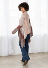 [Color: Brown/Oatmeal] A model wearing a brown and oatmeal mélange stripe cardigan. With long sleeves, a waterfall hemline, an open front, and a lightweight relaxed fit. 