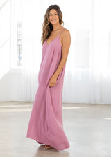 [Color: Smokey Orchid] A light purple harem maxi dress. This billowy maxi tank top dress features a deep v neckline, adjustable spaghetti straps, and a cocoon fit. 