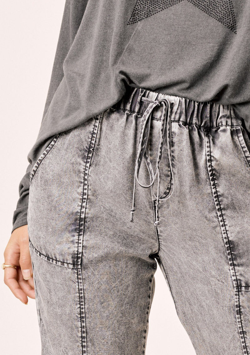 [Color: Acid Black] Lovestitch acid indigo wash jogger pant with seamed detail and elastic drawstring waist.