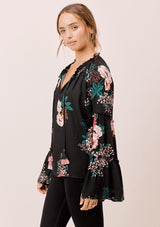[Color: Black] Lovestitch black Floral printed, bell sleeve, bohemian top with tie neck and ruffle details. 