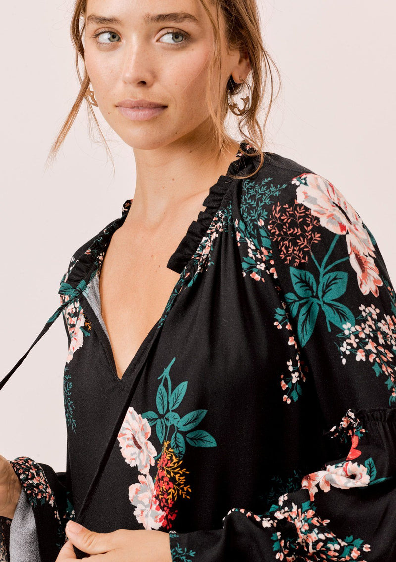 [Color: Black] Lovestitch black Floral printed, bell sleeve, bohemian top with tie neck and ruffle details. 