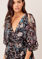 [Color: Black/Apricot/Blue] Perfect winter and summer, day to night floral maxi dress featuring a sexy open back, long split sleeves and a plunging V-neckline. Show a little leg in the flattering floral Glenna Mini Dress in Black.