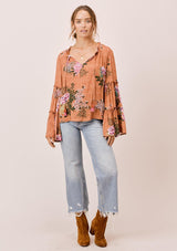 [Color: Saddle] Lovestitch saddle brown Floral printed, bell sleeve, bohemian top with tie neck and ruffle details. 