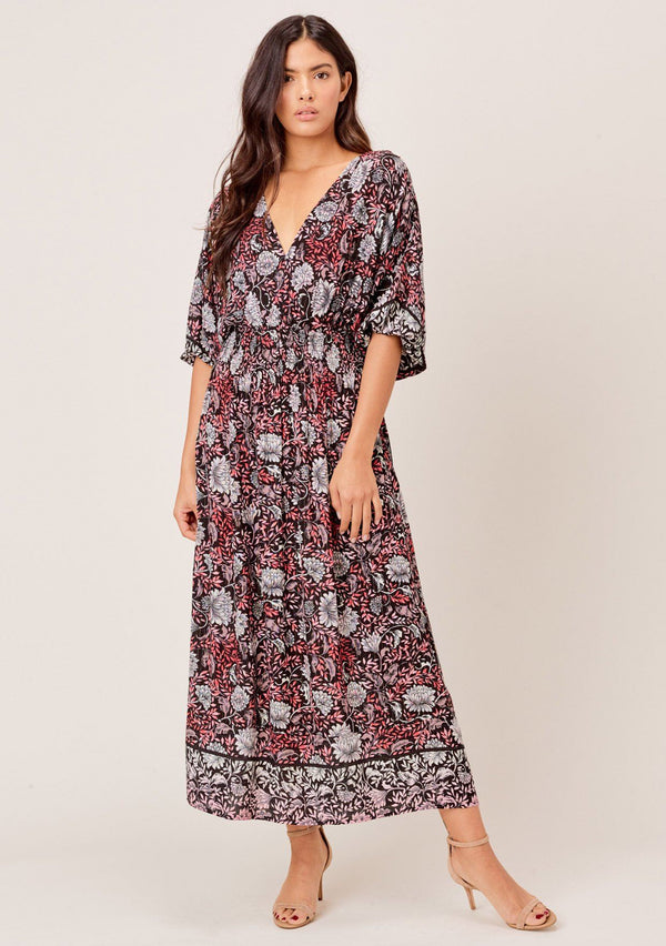 [Color: Black/Rose] A pretty bohemian chic maxi dress. Features a smocked elastic waist and an open back with tassel tie closure. Subtle metallic threads catch the light every time you move.
