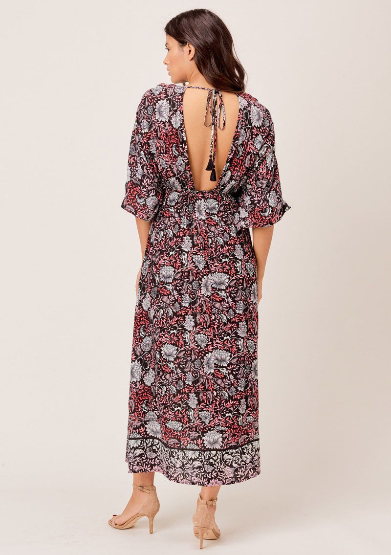 [Color: Black/Rose] A pretty bohemian chic maxi dress. Features a smocked elastic waist and an open back with tassel tie closure. Subtle metallic threads catch the light every time you move.