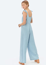 [Color: Heritage Blue] Lovestitch light blue, wide-leg, sleeveless, tencel jumpsuit with tie shoulder detail and buttoned top.